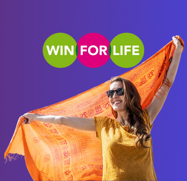 success story win for life woman festival with a flag